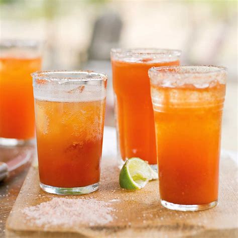 Place coarse salt in a shallow dish; run a lime wedge around rims of 2 cocktail glasses. . Michelada pronunciation